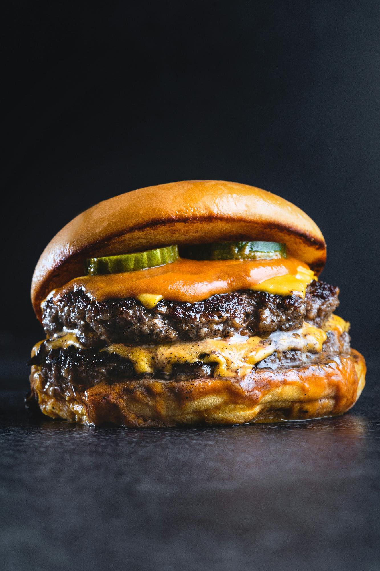 Wagyu smashburger on a grill