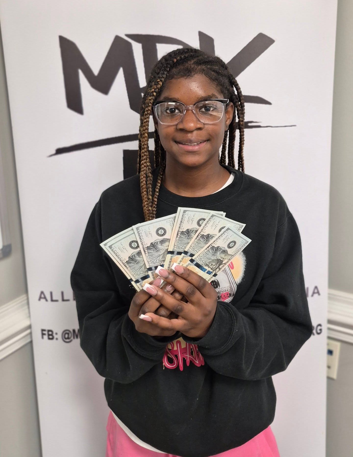Teen female tech founder presenting app design
