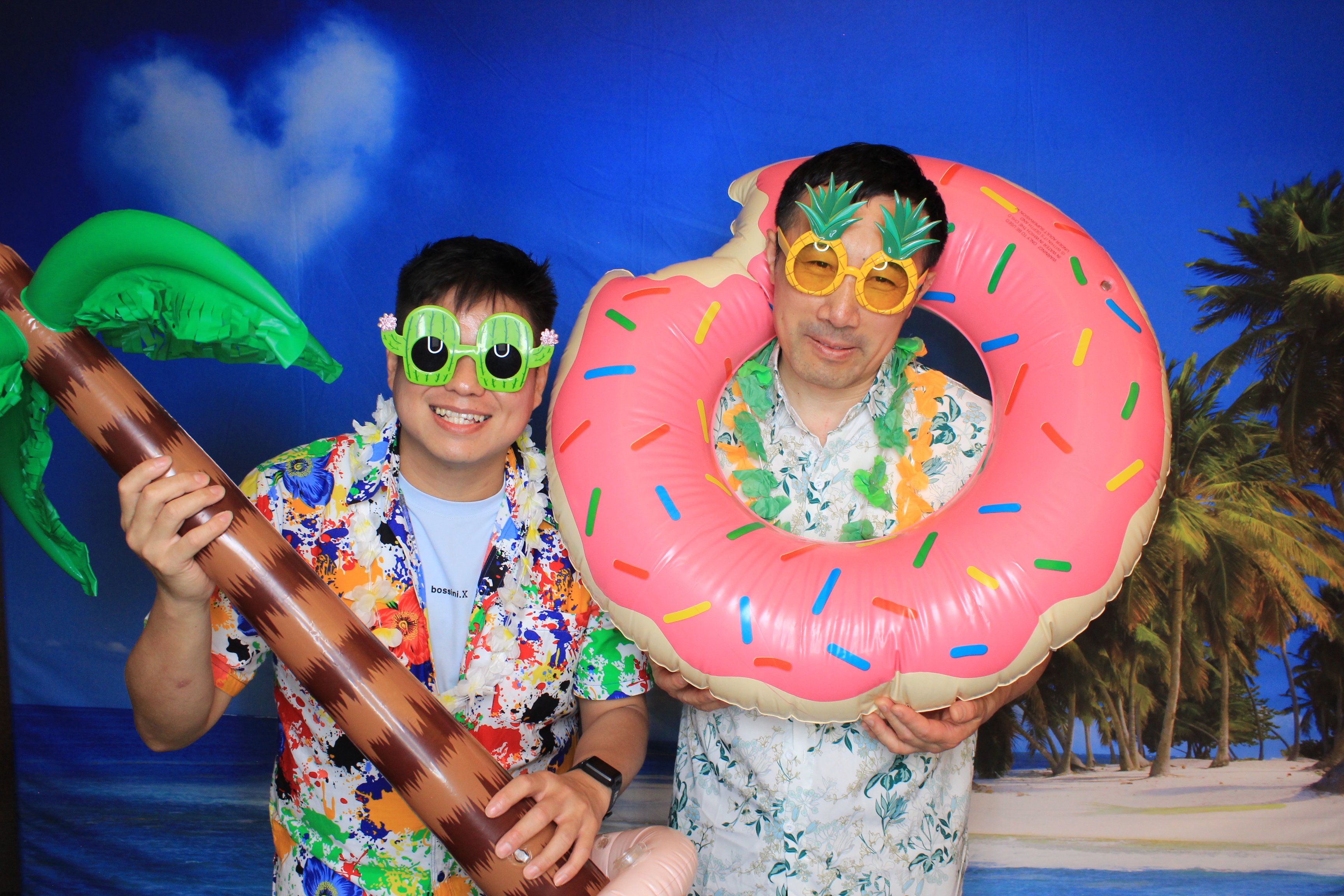 Happy guests enjoying an I-Click.SG photobooth experience in Singapore