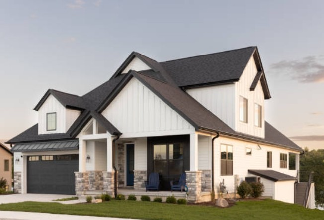 A subtle image of a protective barrier being applied around the foundation of a home. The barrier should be invisible to the naked eye, but its effectiveness should be implied through the surrounding environment, which is pest-free and healthy. Style: Subtle yet effective, conveying a sense of security. Technical specs: 4K resolution, showcasing the landscape surrounding the home.