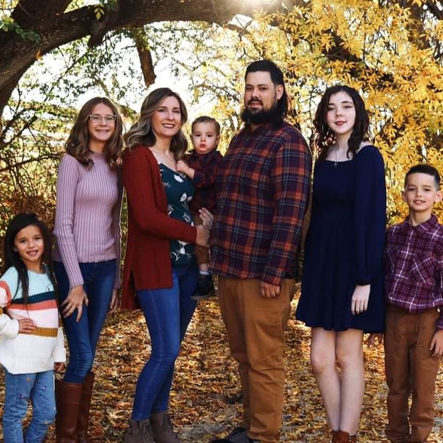 A lively private event setting depicting a birthday party with colorful decorations, a cake in the foreground, and guests laughing and mingling. Soft ambient lighting creates a warm atmosphere, showcasing joyful expressions and engaging interactions.