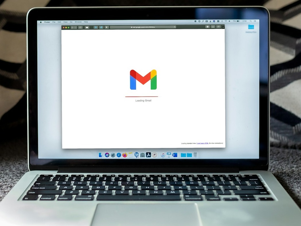 A sleek website contact form with fields for name, email, message, and a submit button. The background is a minimalist white with a soft blue gradient. The form is styled in a modern, clean design. The image should have a professional and welcoming vibe.