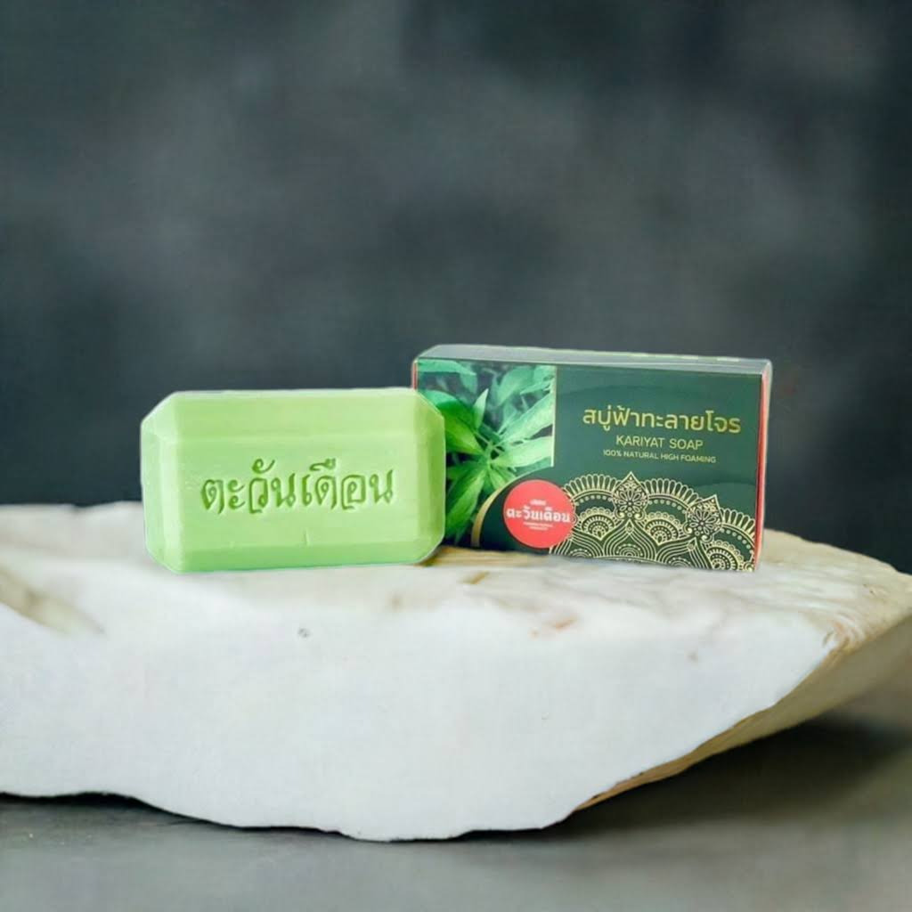 A split image showing one side with a rustic, traditional Thai apothecary setting with herbs and ingredients, and the other side featuring the Andrographis Paniculata herbal cream soap, highlighting its natural ingredients and traditional roots. The overall style should convey a blend of ancient wisdom and modern luxury.