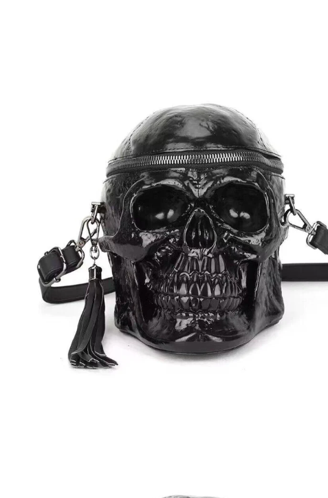 An antique writing desk adorned with gothic artifacts, including a skull, a raven feather, and a half-written manuscript. The manuscript contains elegant gothic calligraphy and evocative descriptions of a dark and mysterious product. Soft, natural light streams in from a nearby window, illuminating the scene with a sense of historical authenticity.