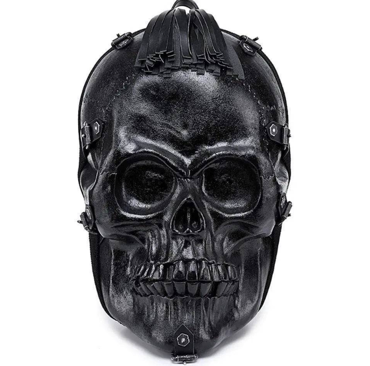 A dramatic image showcasing a gothic skull bag partially obscured by shadows. The shadows create a sense of mystery and intrigue, drawing the viewer's eye to the bag's unique design. The lighting is carefully controlled to highlight the bag's texture and form, while also adding to the overall gothic atmosphere.