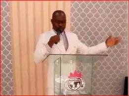 A photorealistic image of a pastor offering a comforting hand to a congregant in a church setting. Use warm, inviting lighting. The style should be natural and compassionate, emphasizing the human connection.