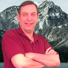 Wayne Sharer with mountain background