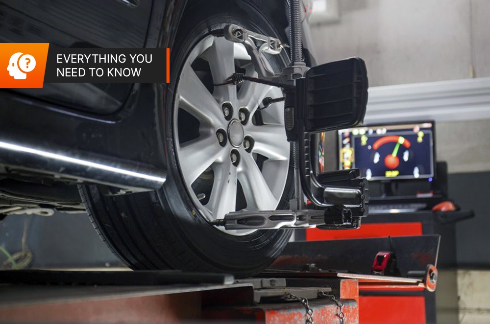 Create an image depicting a 'Certified Inspection Station'. The image should include the official certification emblem, a clean and organized inspection bay, and a vehicle undergoing inspection. The lighting should be bright and professional, emphasizing the trustworthiness of the facility. The color palette should be blues, whites, and greens, reflecting certification and reliability. The shot should be a medium shot, focusing on the certification emblem and the inspection process. The environment is a modern inspection facility. Aim for a photorealistic style with high attention to detail.