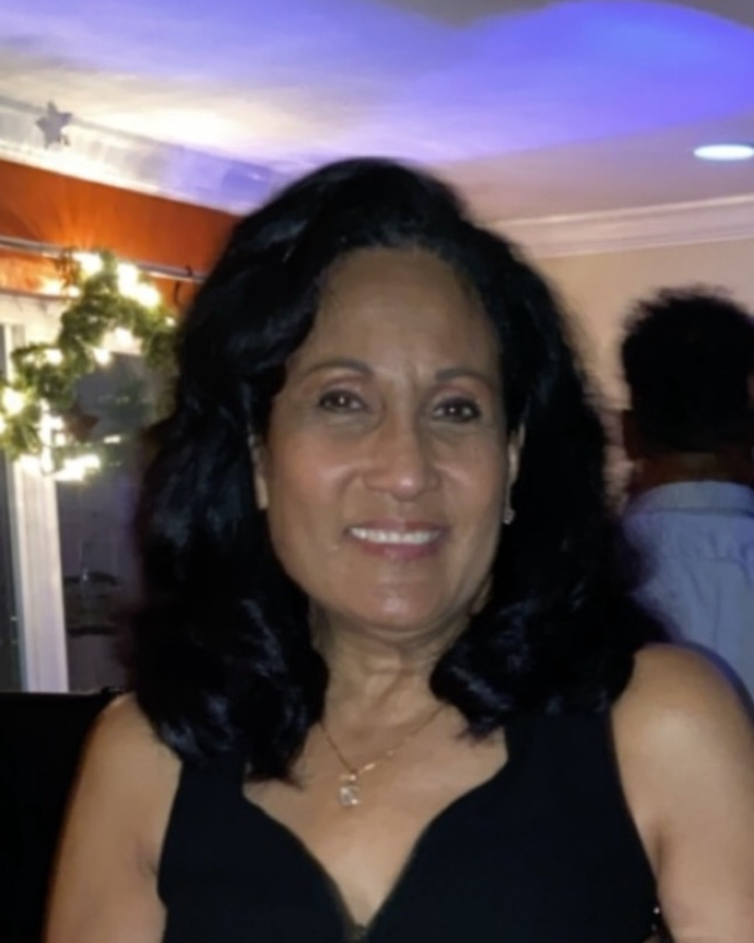 An image of Carole Ann Creque handing over notarized documents to a client at their home or office. The image should feel friendly, professional and highlight the convenience of mobile services.