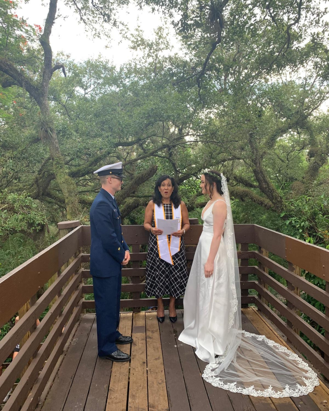 A photo of Carole Ann Creque meeting a client in a neutral location (such as a cafe) to provide notary services. The image should be bright, friendly, and convey the convenience of mobile notary services.