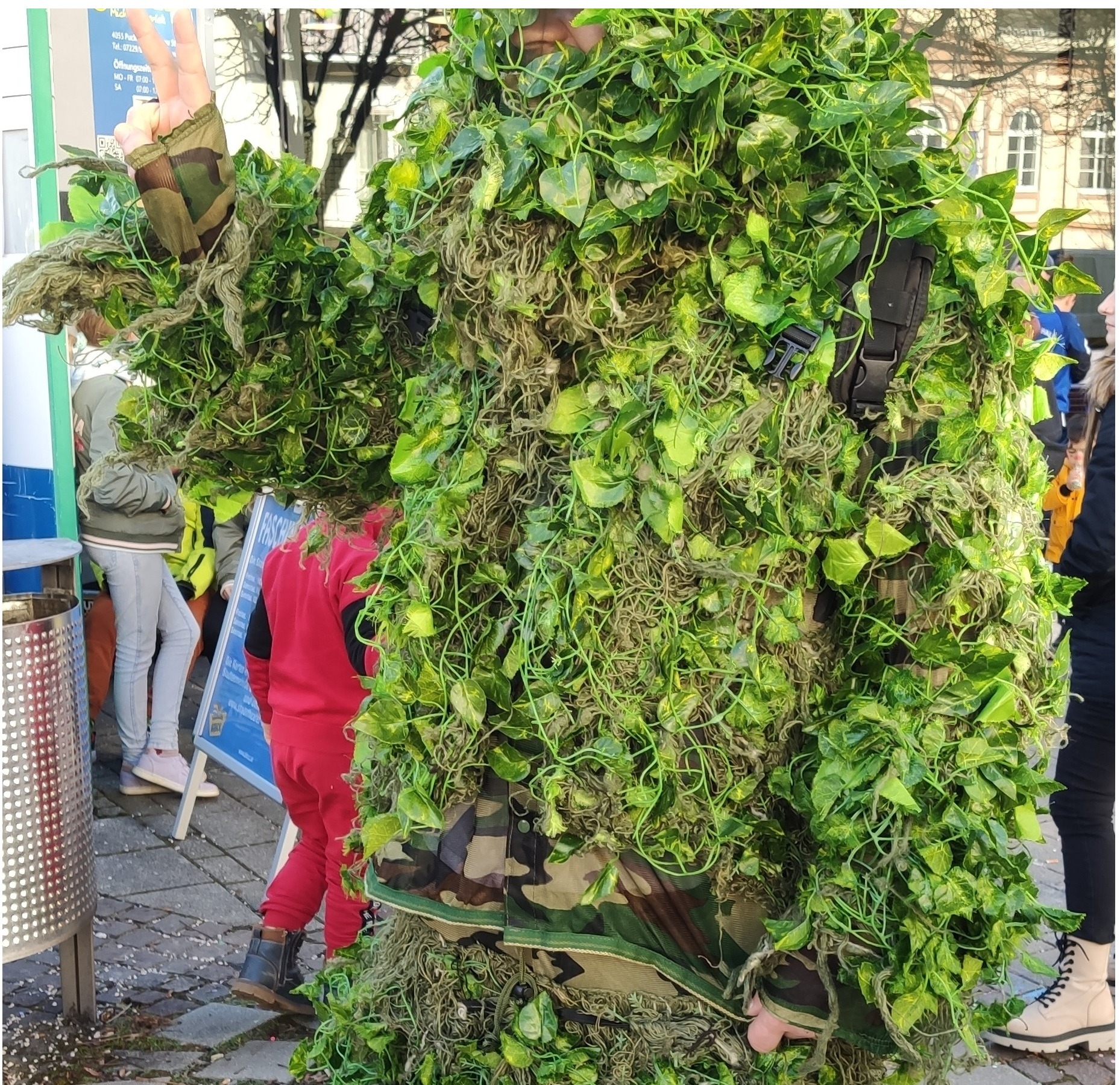Create a highly detailed image showcasing a variety of the unique and creative costumes worn during the Bad Hall Carnival. The image should highlight the craftsmanship and artistry involved in the creation of these costumes. Capture the details and textures to create a visually captivating result.