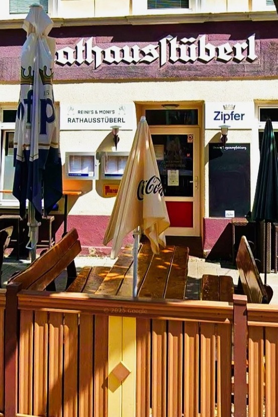 A wide-angle shot of the terrace at dusk, with soft, warm lighting. Feature happy patrons enjoying drinks and conversation. The image should evoke a sense of relaxation and conviviality.