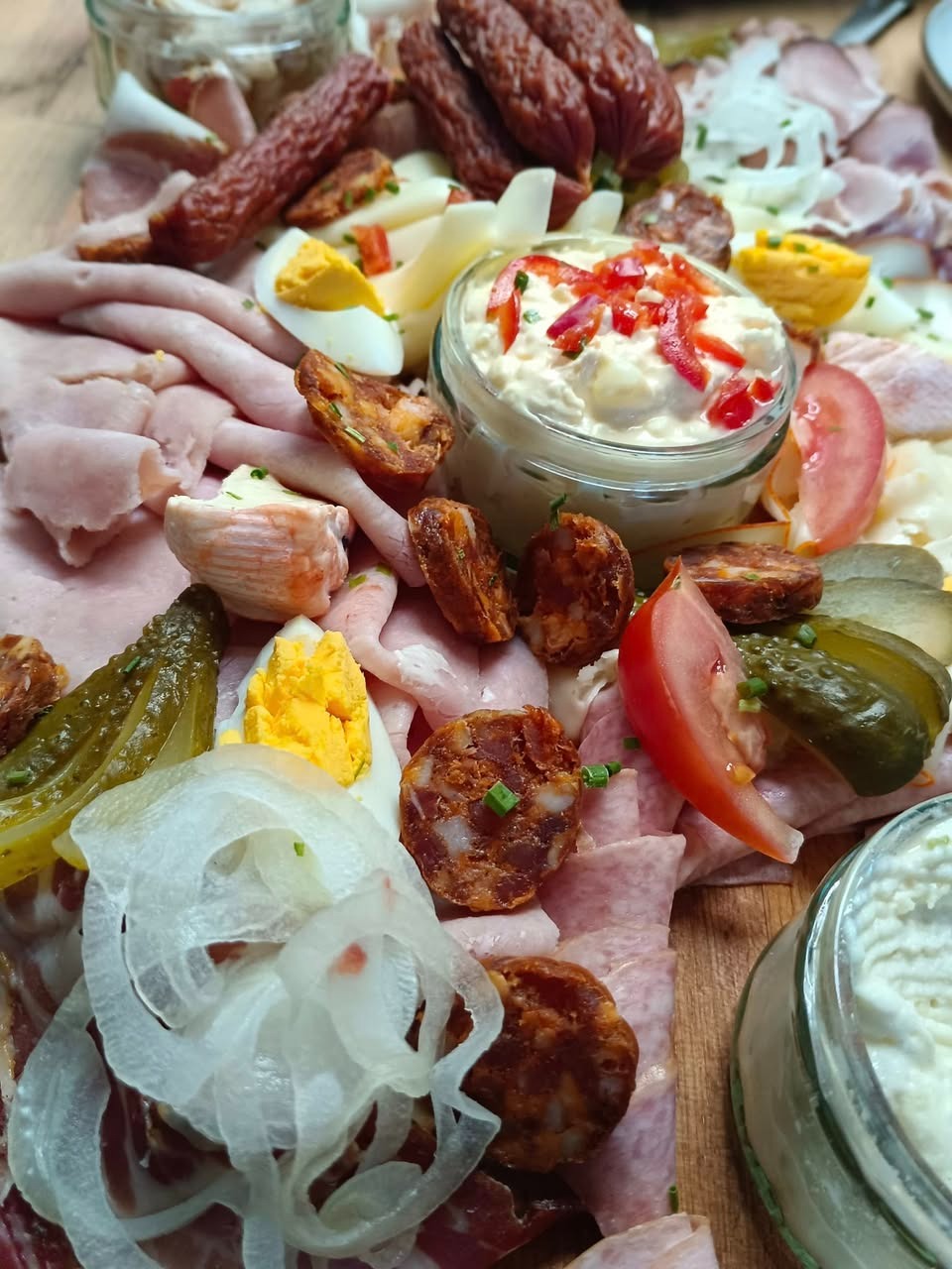 A close-up, slightly stylized image of various spices and ingredients used in the RathausStüberl kitchen. The image should emphasize the freshness and quality of the ingredients. Consider using a macro lens for extreme detail.