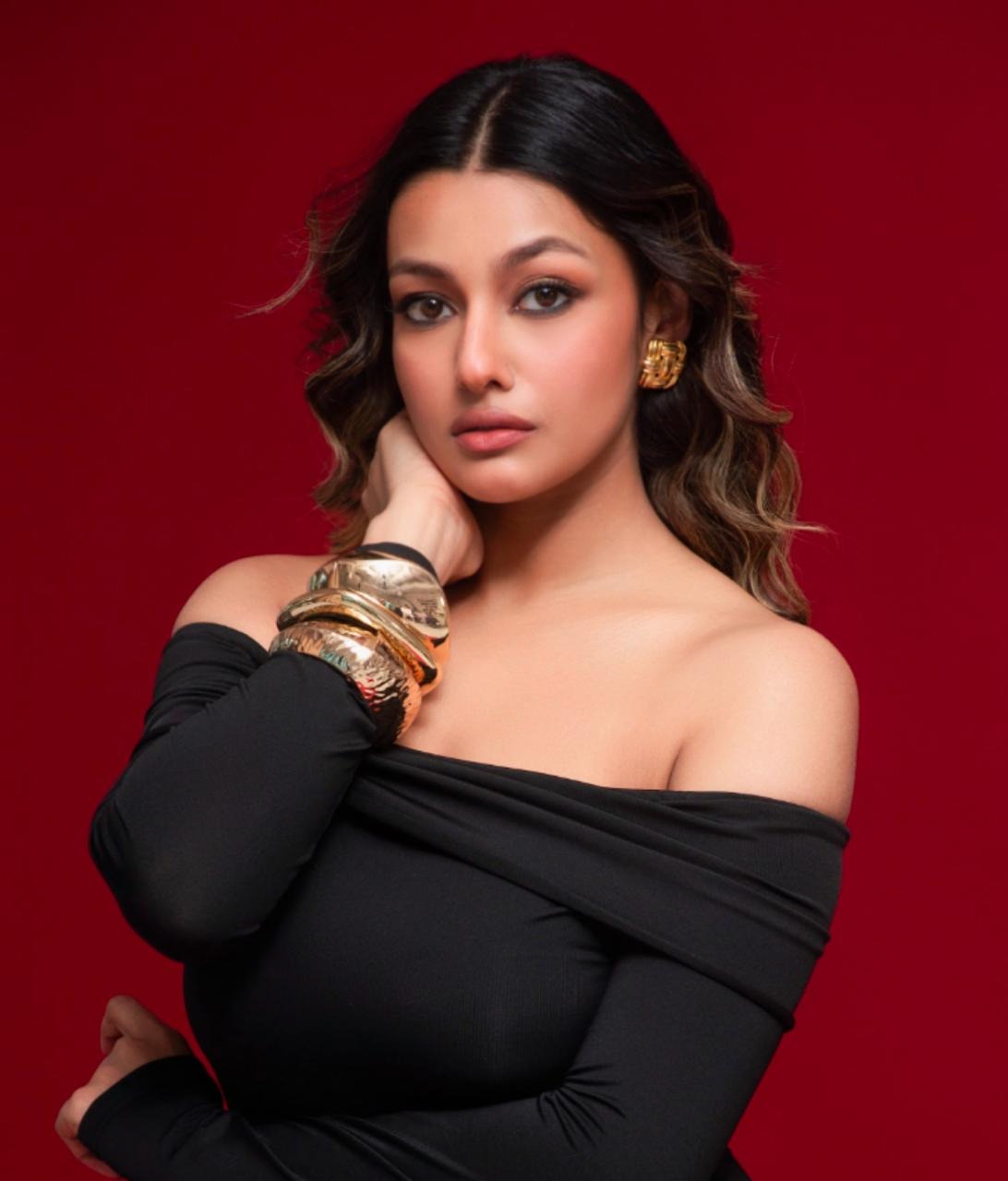 A photorealistic, ultra-high-quality 8K resolution header image for Ibtsha Aura. The image should depict a woman with flawless, glowing skin, radiating confidence and serenity. She should be in her late 20s or early 30s, with a gentle smile. Soft, diffused lighting should highlight her features, creating a warm and inviting atmosphere. The background is a blurred, elegant spa setting with hints of natural elements like orchids and bamboo. The color palette should be soft and muted, with shades of rose gold, cream, and blush pink dominating. Camera angle should be a slightly low angle, emphasizing her confidence. The image should evoke a sense of tranquility, self-love, and empowerment, perfectly embodying "Crafted by Confidence. Glowing with Ibtsha."