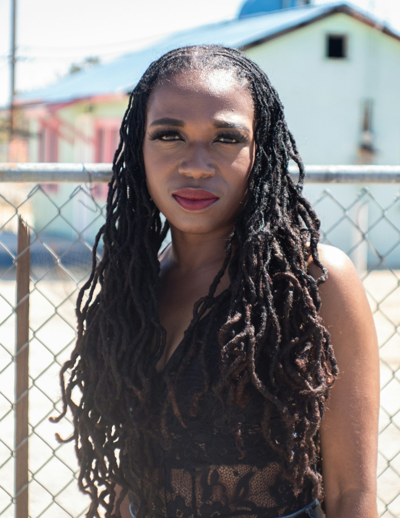 Illustrate Jennifer engaging with a client, explaining the techniques she’ll use to style their hair. The salon's interior should be stylish and welcoming, with hair products and tools artfully arranged around them. Capture expressions of trust and excitement as they discuss options. The scene should feel intimate and professional, rendered in stunning hyperrealistic details in 8K.