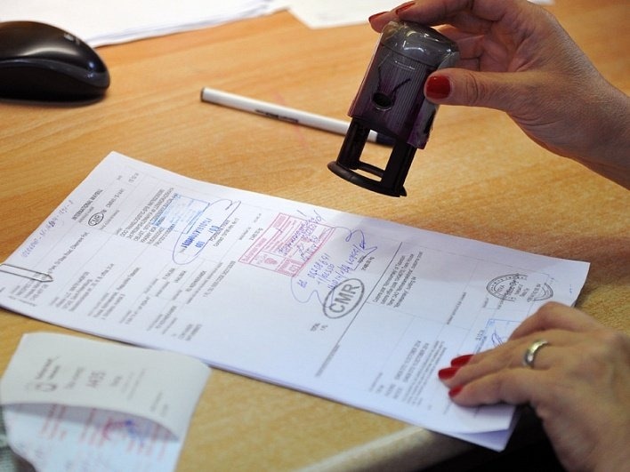 An image highlighting space optimization in a commercial setting. Show the effective use of furniture and layout design to create a more efficient workspace, emphasizing the use of beige and white.