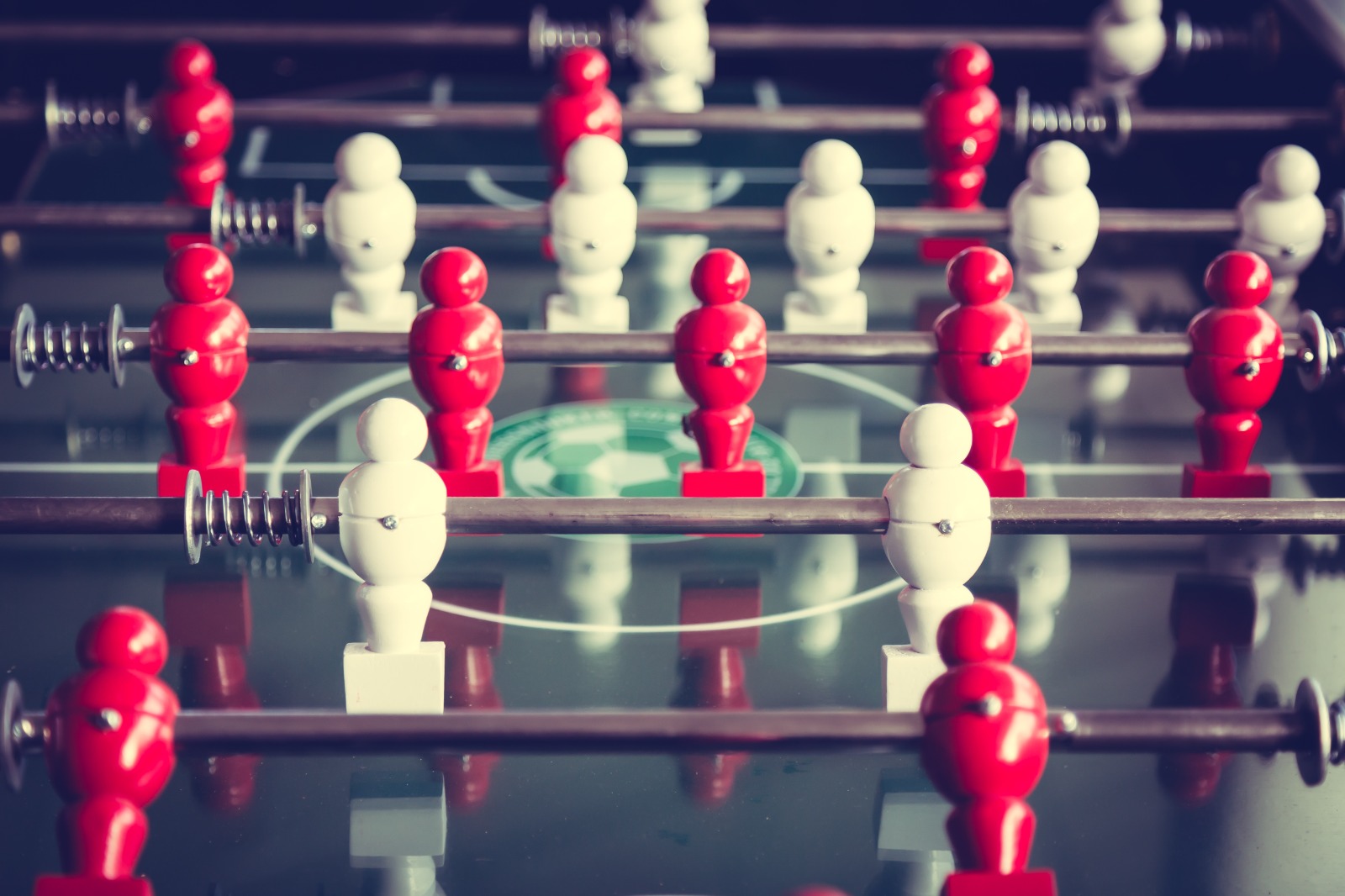 A dynamic image showing a Turkish vendor outmaneuvering competitors in a bustling online marketplace, symbolized by chess pieces on a digital board. The Turkish vendor is represented by a strong, confident figure, strategically placing their products. Style: A blend of realism and stylized elements, emphasizing movement and strategy. Colors: Bold and contrasting colors to highlight the competitive nature. Technical specs: 4K resolution, dynamic composition.