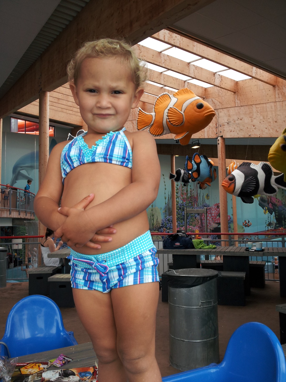 Design a visually appealing photo gallery layout for Ester Elin Lima Amdal. Imagine a grid of framed photographs, each showcasing a unique moment in her life. The frames could be stylized with different textures and colors to add visual interest. The photos should be diverse, representing different aspects of her life: family, friends, hobbies, travel, etc. Use a consistent color palette to create a cohesive and visually harmonious gallery. Add subtle effects like shadows and highlights to create a sense of depth and realism. The overall composition should feel inviting and nostalgic, encouraging viewers to explore her memories.