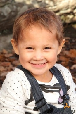 Illustrate a winding path representing Ester Elin Lima Amdal's journey to sixteen. Along the path, place stylized icons or vignettes depicting key milestones, personal achievements, and transformative experiences. Include imagery representing childhood dreams, academic successes, artistic endeavors, and meaningful relationships. The path should be visually engaging, with varying widths, textures, and colors to represent the ups and downs of life. Use a bright and optimistic color palette to evoke a sense of growth and possibility. Add elements like footprints, flowers, and butterflies to symbolize progress and transformation. The overall composition should feel like a journey worth celebrating.