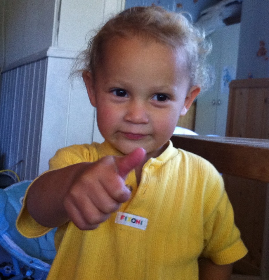 Craft a visually powerful representation of Ester Elin Lima Amdal 'finding her voice.' Imagine a microphone bathed in light, surrounded by symbols of her passions: a paintbrush, a musical note, a book, a camera. The colors should be bold and vibrant, reflecting her growing confidence and self-expression. Include elements like sound waves, musical scales, and handwritten words to symbolize her creative output. The overall composition should feel empowering and inspiring, encouraging viewers to find their own voices and express themselves authentically. Add a touch of magical particles around the image.