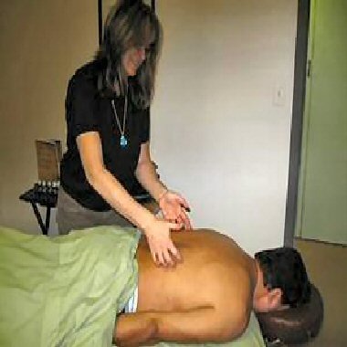 A stylized image depicting a therapist and client in a consultation, reviewing a personalized therapy plan on a tablet. The scene should convey a sense of collaboration and trust, with a focus on data visualization and personalized care. Utilize soft lighting and a modern aesthetic to reinforce the idea of advanced, tailored solutions.