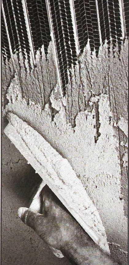 Application of brown coat over scratch coat