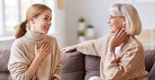An engaging image showing an elderly person receiving personalized advice from an AI interface on a screen. The room is bright and welcoming, decorated with Christian imagery. The focus should be on the interaction, highlighting the benefits of technology that understands their unique needs.