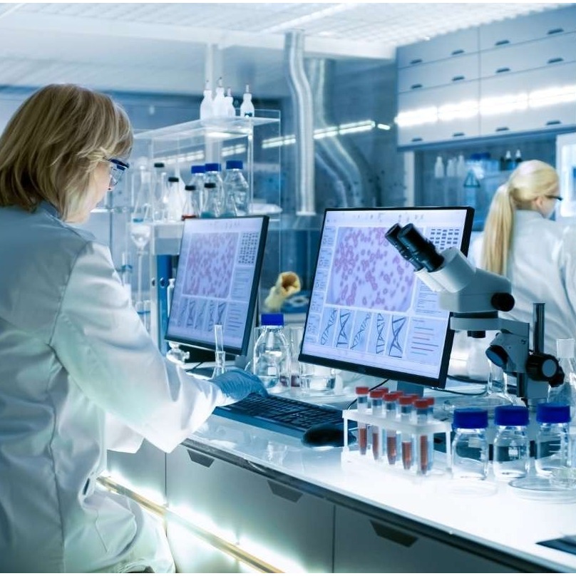 A photorealistic image of a community gathering, with people learning about nutrition and healthy eating. The composition should emphasize the inclusivity and support. The lighting should be warm and inviting, with a color palette dominated by earth tones. The camera angle should be wide, capturing the scale of the gathering. Style reference: documentary photography. Technical specs: 4K, high quality.