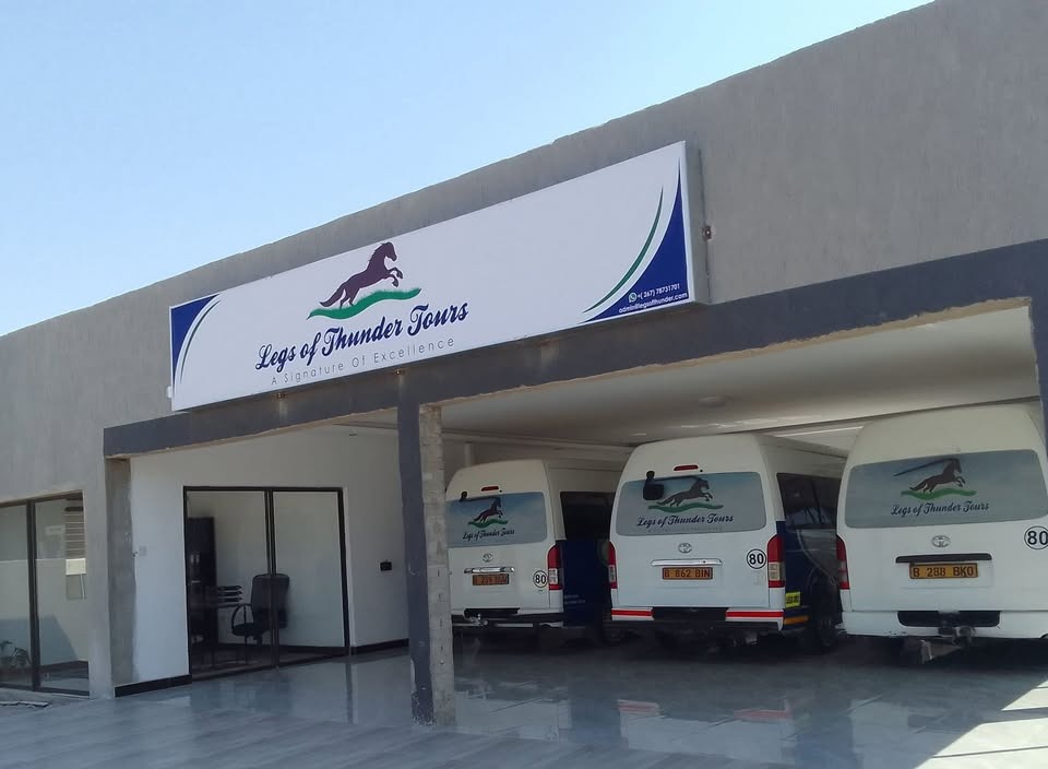 Create a photorealistic image for the 'About Us' section of 'Legs of Thunder Tours'. The image should feature a globe gently held by diverse hands, symbolizing unity and global exploration. The background should subtly showcase landmarks like the Eiffel Tower, the Great Wall of China, and Machu Picchu. The lighting should be soft and diffused, creating a welcoming and inclusive atmosphere. The color palette should be warm and earthy, with hints of vibrant colors to represent the diversity of cultures. The camera angle should be slightly elevated, providing a comprehensive view of the globe and the hands. Ensure the image is of high quality with a 4K resolution, focusing on realistic textures of the hands and the intricate details of the globe.