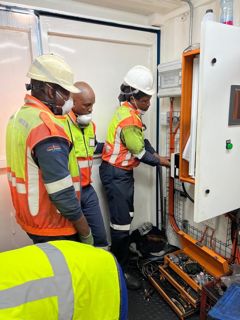 A stylized image representing compliance assurance through automated tracking and reporting. The scene shows a digital dashboard displaying real-time compliance metrics, with automated alerts and notifications. The color palette is clean and efficient, with blues and greens promoting a sense of compliance. The camera angle is a close-up shot, focusing on the dashboard and its metrics. Textures are smooth and modern, emphasizing the technological innovation. The style should be reliable and transparent, conveying a sense of accountability and trust.