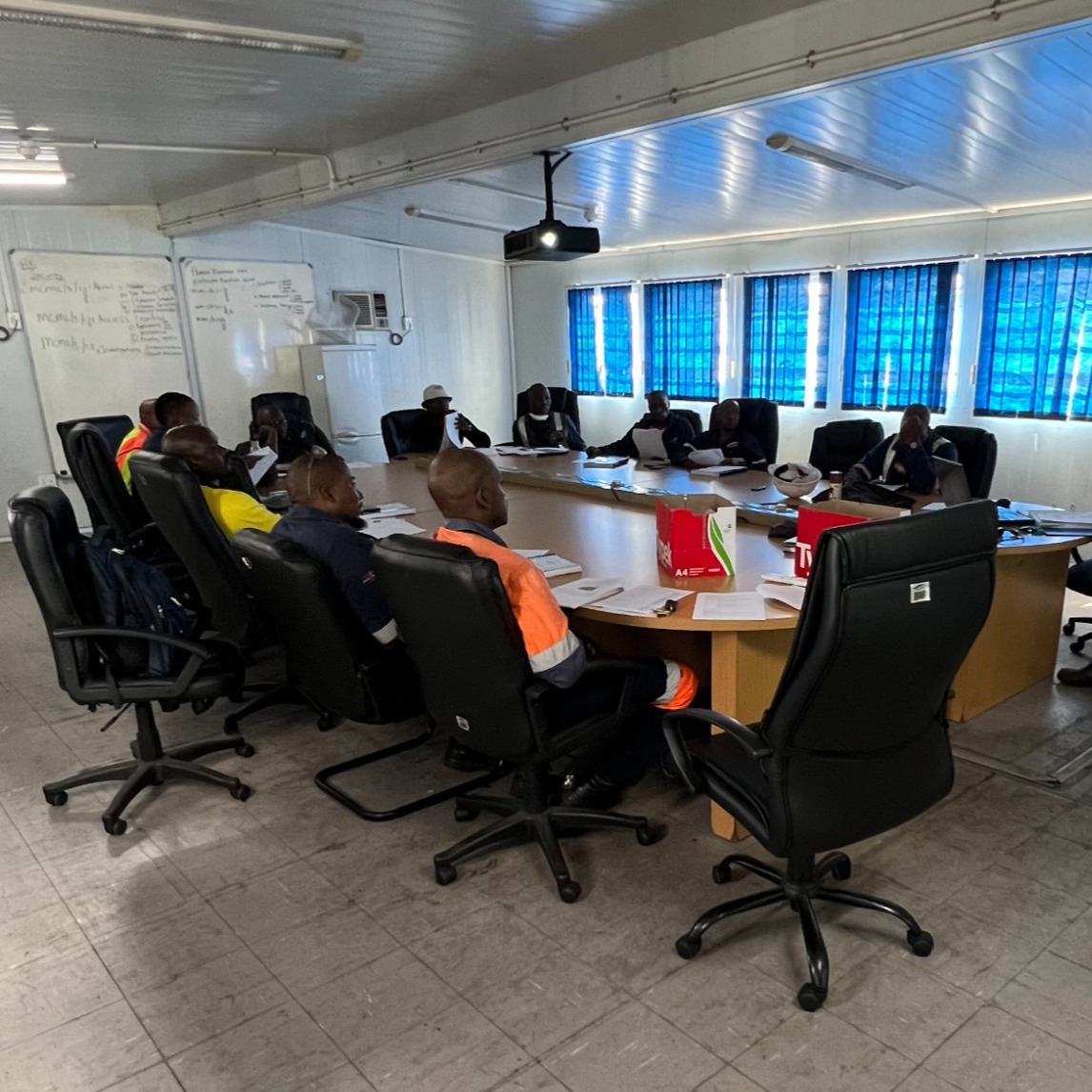 A stylized image representing sustainability solutions. The scene should show a harmonious integration of technology and nature, with solar panels, wind turbines, and green roofs contributing to a sustainable environment. The color palette should be vibrant and optimistic, emphasizing the benefits of sustainability.