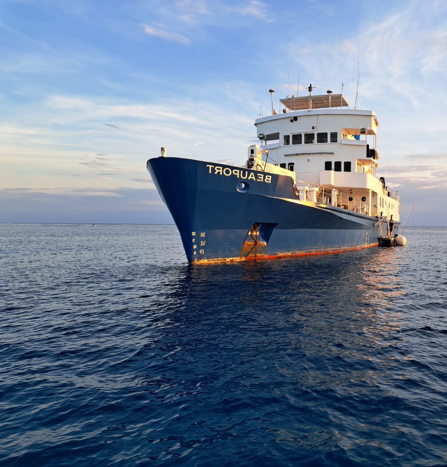 A stylized image depicting the evolution of Beauport Yacht's design and construction over the years; use an artistic approach, perhaps combining historical imagery with modern elements, emphasizing the timeless elegance and craftsmanship.