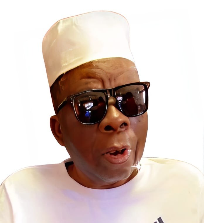 A photorealistic portrait of Chief Alhaji Sule Dada Bakare, radiating wisdom and kindness. He should be dressed in traditional Nigerian attire, with a dignified expression. The background should be subtly blurred to keep the focus on his face. The lighting should be soft and warm, emphasizing his age and experience. Consider a slightly low camera angle to convey respect and admiration. Use a color palette of warm earth tones and gold. Style reference: classic portrait photography with an emphasis on character and gravitas.