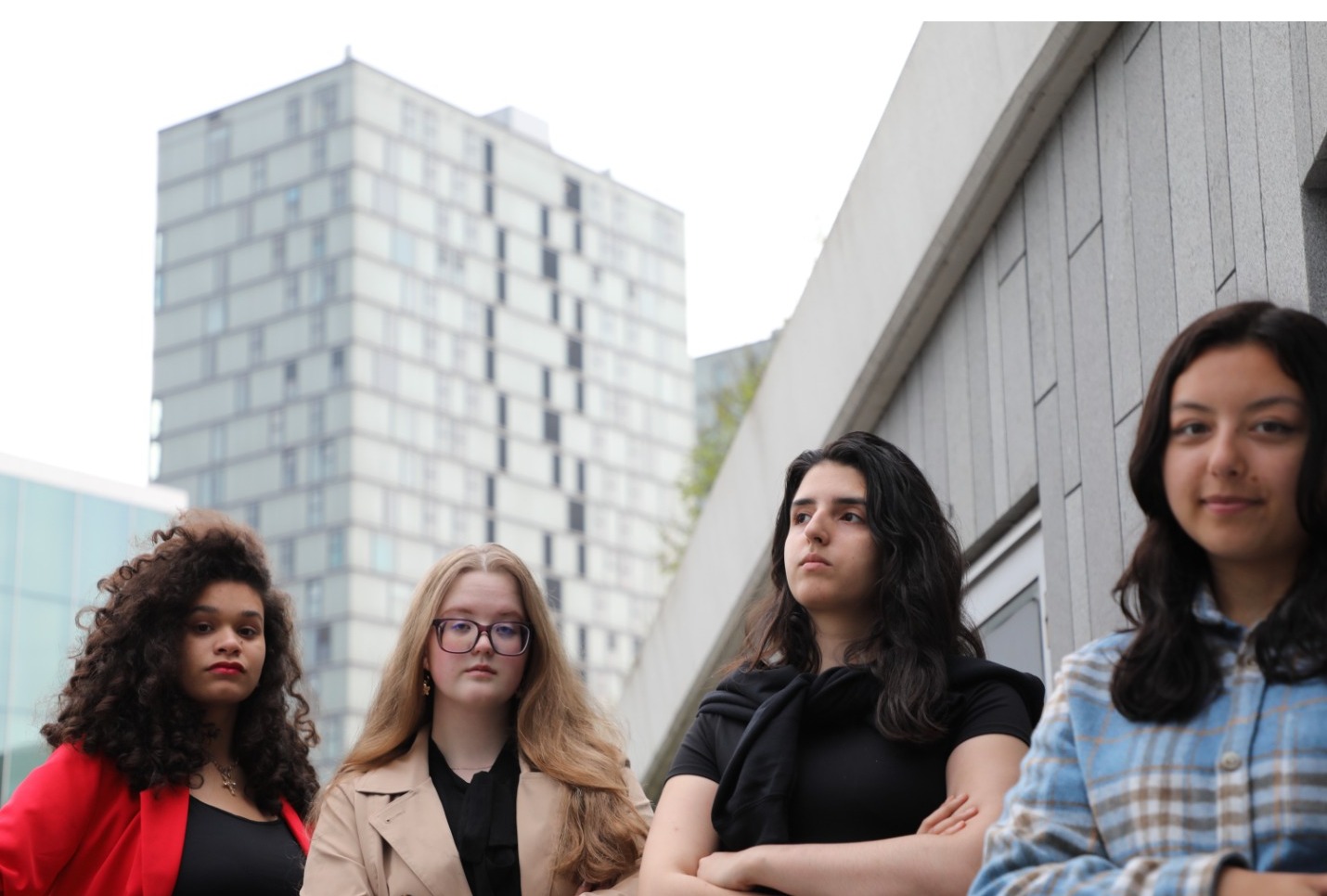 Depict a diverse group of young people holding hands, forming a circle around the Earth. The circle represents unity and solidarity, and the Earth represents the shared responsibility we have for our planet. The camera angle should be a wide shot, capturing the scale of the circle and the fragility of the Earth. Style reference: Symbolic illustration, emphasizing unity and responsibility. Technical specs: High resolution, stylized.