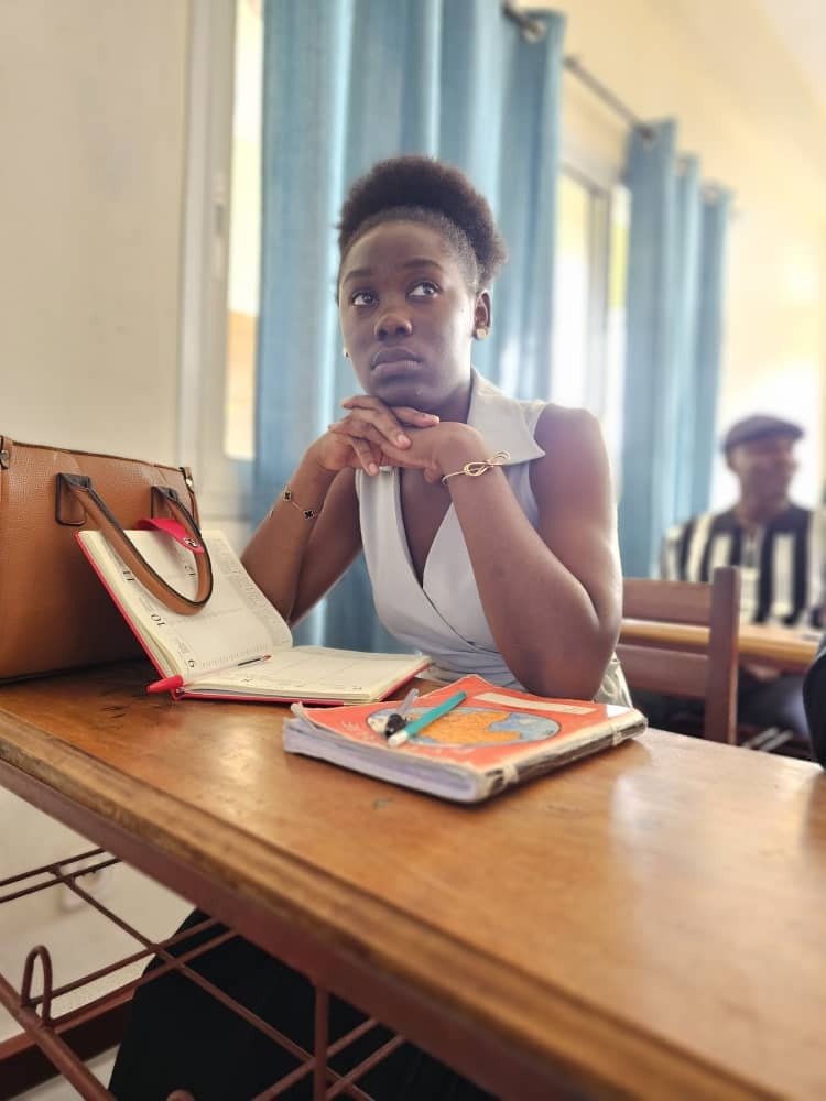 A visual representation of a graph showing an upward trend in student performance after implementing GPT-powered educational programs. The graph should be stylized and visually appealing, with bright colors and clear data points. Lighting is bright and positive. The background should be a modern classroom setting. Style reference: Data visualization and educational infographics. Technical specs: 4K resolution, high quality.