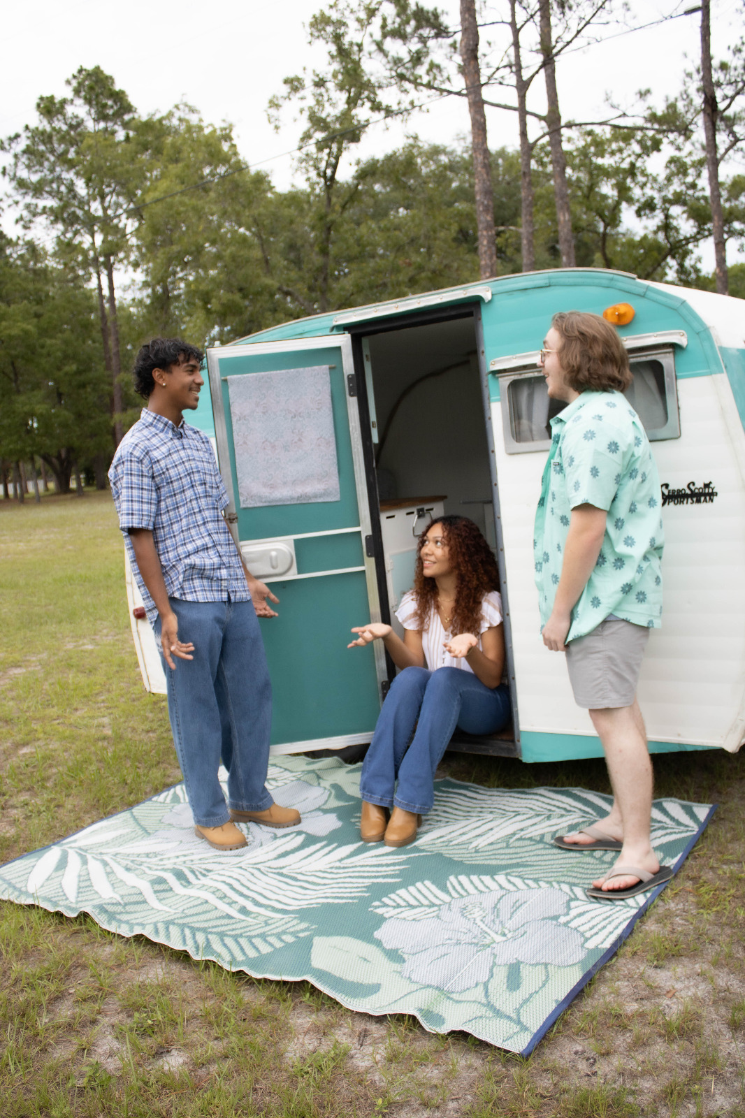 A stack of freshly printed photos from the Blue Sky Day photo booth, neatly arranged on a table. The photos depict various groups of people having fun and making memories. The focus is on the abundance and quality of the prints, suggesting the value and satisfaction of the unlimited print package. The lighting should be soft and flattering, highlighting the details of the images. Style reference: A product advertisement emphasizing the affordability and convenience of unlimited prints.