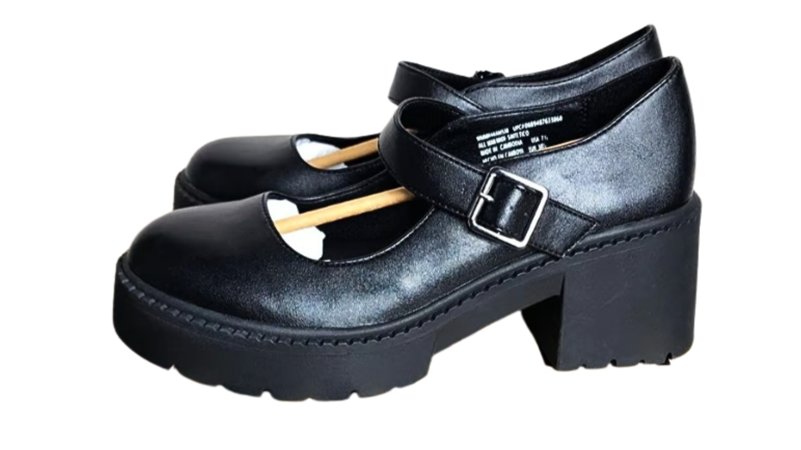 Create a photorealistic image of a curated display of pre-owned vintage items. The items should include a vintage camera, a stack of old books, a piece of antique jewelry, and a quirky collectible toy. The arrangement should be artful and visually appealing, showcasing the unique character of each item. The lighting should be warm and inviting, highlighting the textures and details of the objects. The environment should be a cozy, inviting retail space with soft lighting and comfortable seating. Consider adding subtle details like a handwritten price tag on one of the items and a soft, vintage-inspired filter to the image. Style references include the still life photography of Irving Penn and the vintage aesthetics of Wes Anderson films. Render in 4K resolution for high-quality detail.