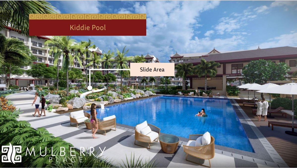 Capture a luxurious swimming pool scene at Mulberry Place Phase 2. Focus on the details: high-end lounge chairs, pristine water, and elegant landscaping. Use a shallow depth of field to create a sense of exclusivity. Style: luxury travel photography.