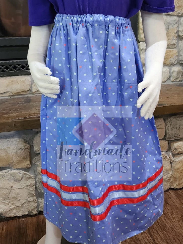 Girl's blue skirt with hearts enlarged