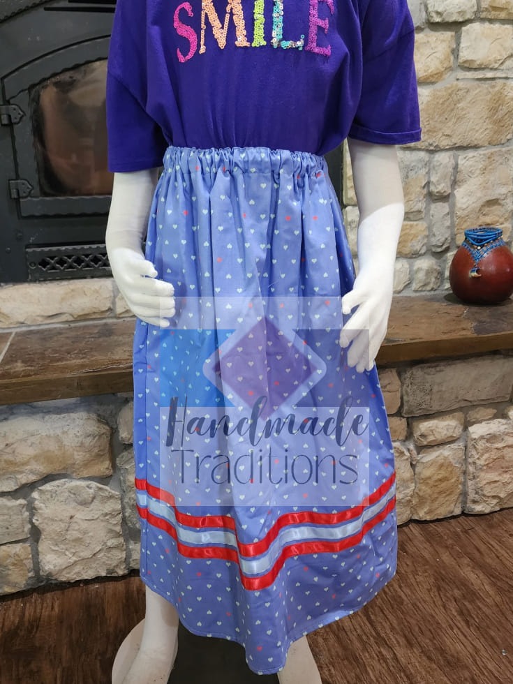 Girl's blue skirt with hearts