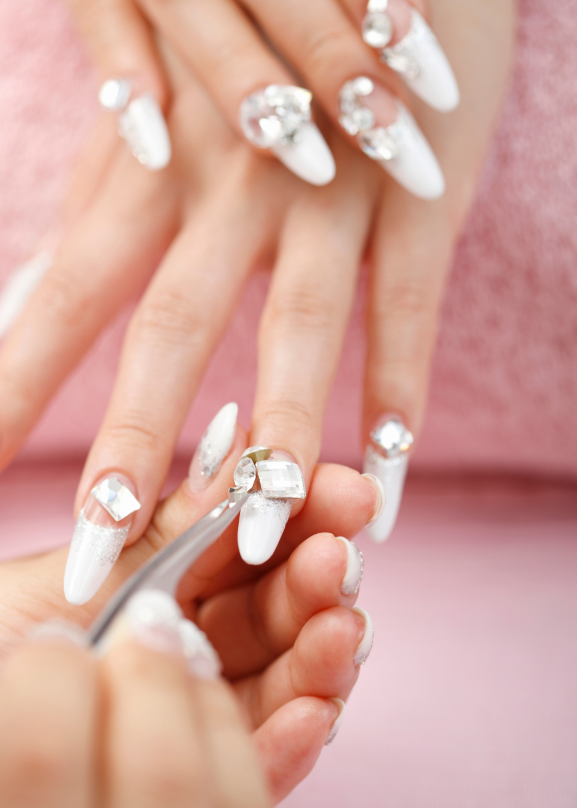 Photorealistic image of hands with perfectly manicured nails showcasing a trendy nail art design. Soft focus background with nail polish bottles. Warm, inviting lighting. 4K resolution.