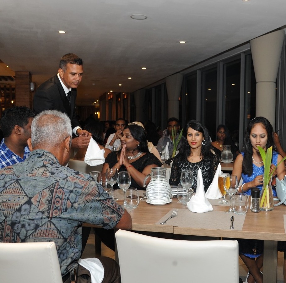 An inclusive image showcasing a diverse group of people participating in a community-building activity, such as volunteering or team-building exercises. Natural lighting enhances the sense of togetherness and collaboration. 4K resolution.