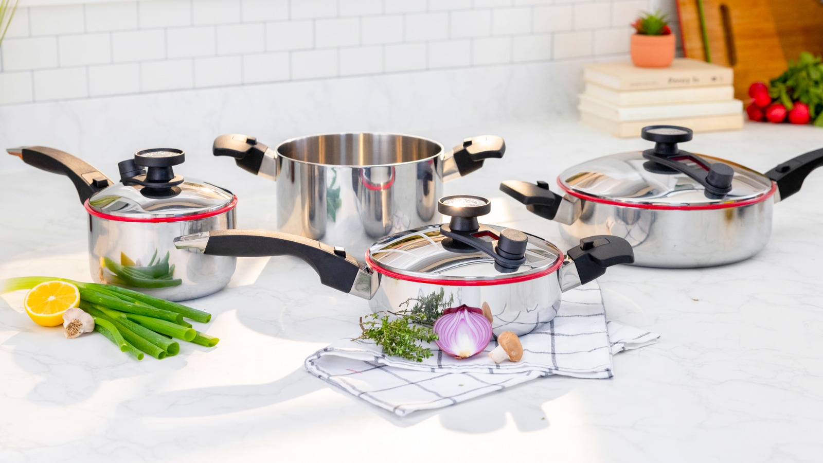 A close-up shot of a chef using a Royal Prestige pot to prepare a gourmet dish, showcasing the sleek design, even heat distribution, and the delicious food being cooked. The background should be a professional kitchen setting with warm, inviting lighting.