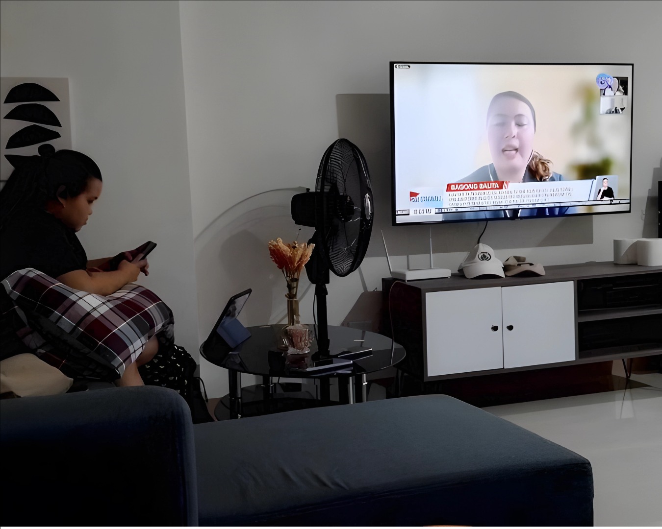 Create a photorealistic image of a serene condo bedroom with soft, diffused lighting. The focus is on the comfortable bed, plush bedding, and calming color palette. Style: Minimalist, zen-like. 4K resolution.