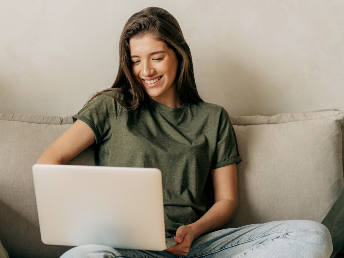 A close-up, photorealistic image of a student receiving personalized online help with their French homework. Corinne is providing feedback and guidance on a digital document. The focus should be on the one-on-one interaction and the personalized support provided.