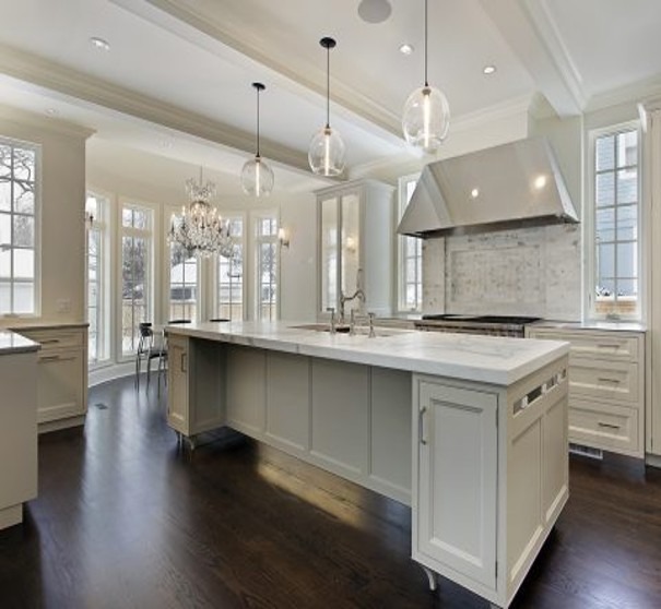 A photorealistic image showcasing the before and after transformation of a commercial office space. The image should feature a split-screen, with the 'before' side showing a dated and worn-out office space, and the 'after' side showing a newly renovated and revitalized space with fresh drywall and paint. The lighting should be dramatic, highlighting the contrast between the two spaces. The color palette should be modern and inviting. The camera angle should be a wide shot, capturing the entire transformation in a single image. Style reference: Interior design before-and-after photography. The image should convey ABC's commitment to transforming commercial spaces.