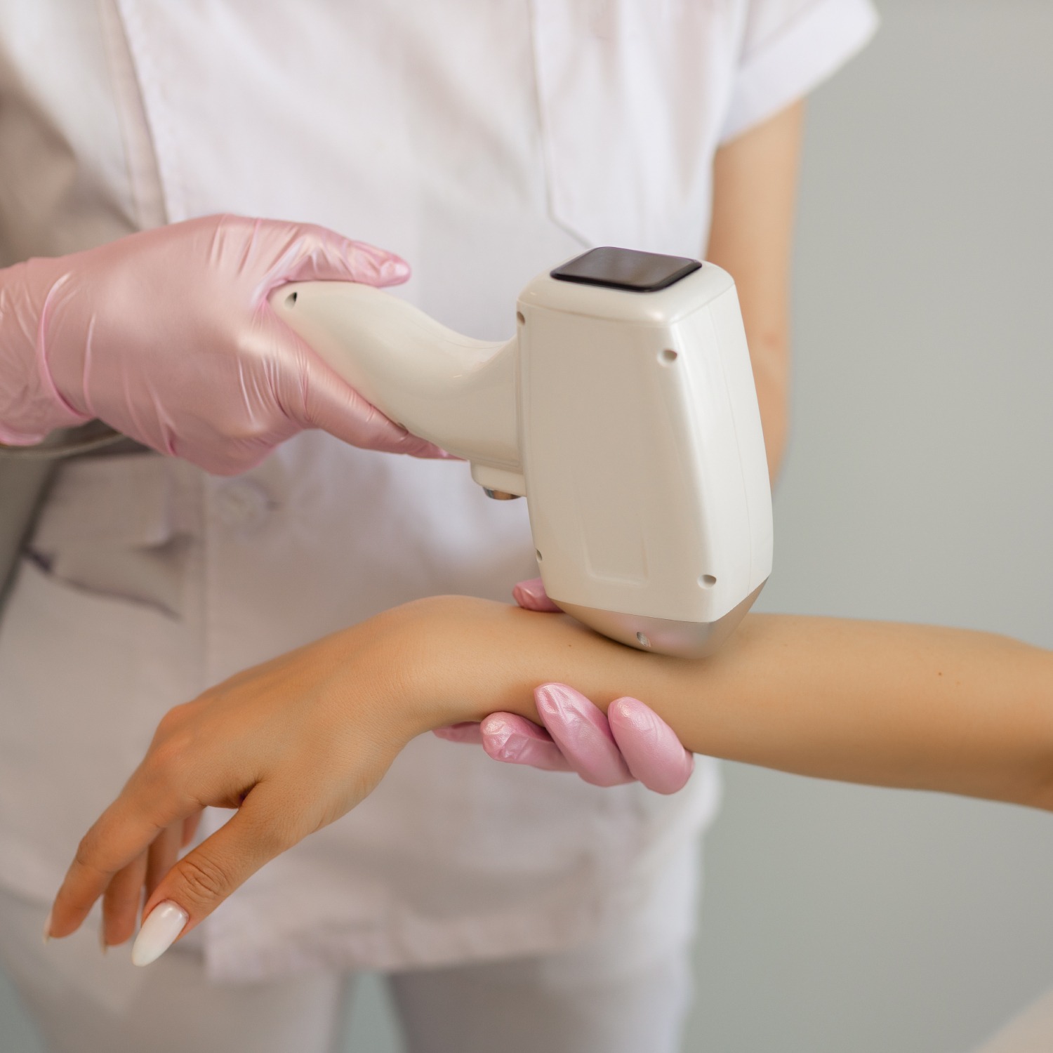 A dermatologist carefully administering a cosmetic injection in a clean, professional environment. Emphasis on precision and safety.