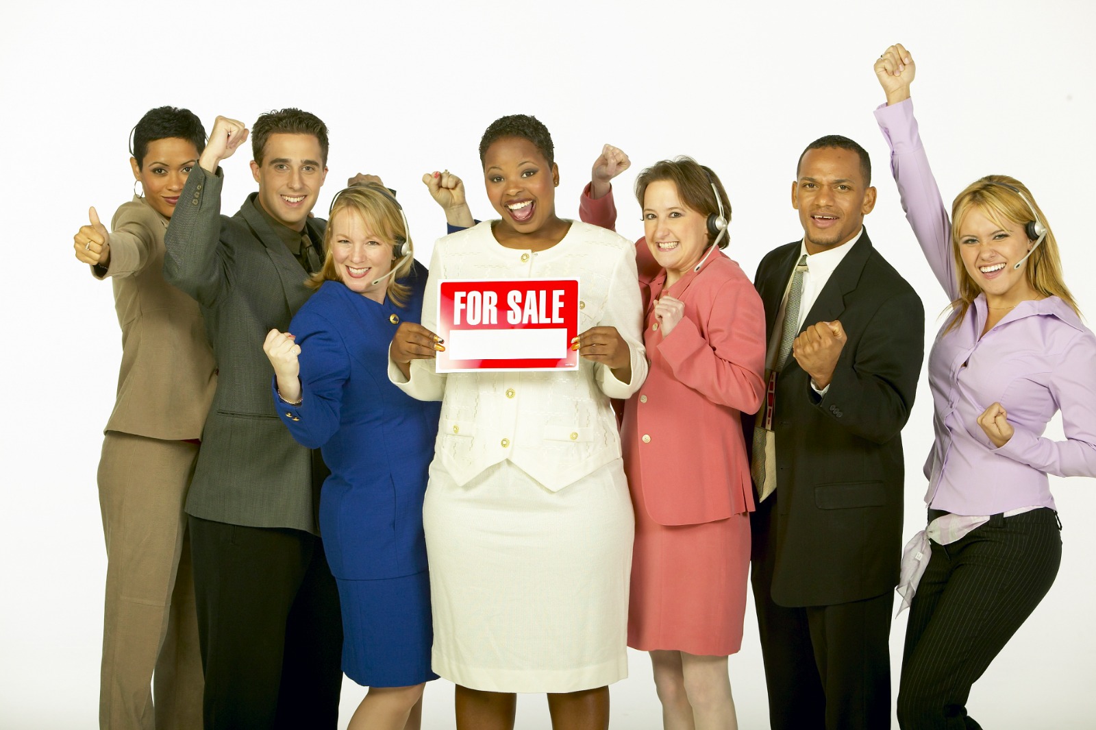 Create a photorealistic image of a diverse team of professionals shaking hands, symbolizing partnership and collaboration. The background should be a modern office building, representing a successful and dynamic business environment. Colors should be warm and inviting, with accents of blue and green. Technical specs: 4K, photorealistic.