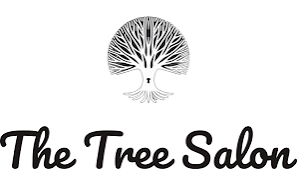 Professional esthetician performing waxing service in a luxurious hotel suite