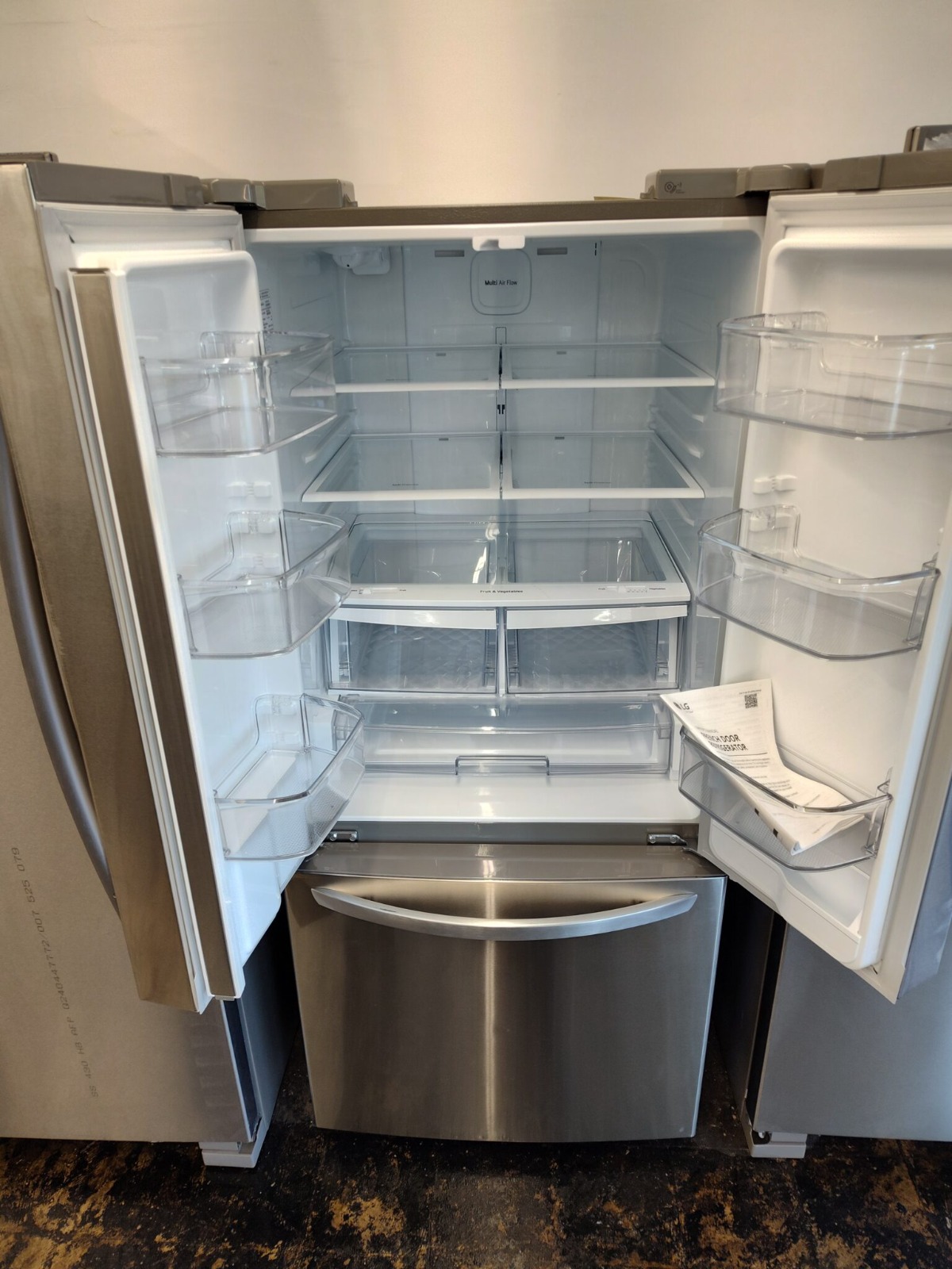 Create a dynamic collage featuring various name-brand appliances, highlighting their logos and showcasing a variety of styles and models available at the store.